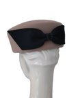 JACKIE - 1960s-style pillbox hat in black wool.