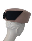 JACKIE - 1960s-style pillbox hat in black wool.