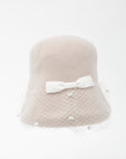 EVELYN - Soft, versatile merino wool cloche with dotted veil and grosgrain bows