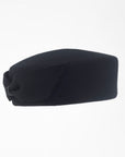 JACKIE - 1960s-style pillbox hat in black wool.