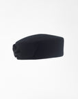 JACKIE - 1960s-style pillbox hat in black wool.