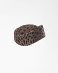 VERONICA - Asymmetric pillbox hat in leoperd-print wool.