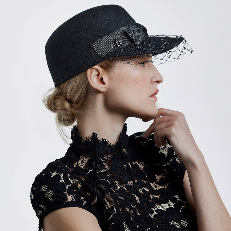Misa Harada Hats | ALPHA | Porter’s cap in black wool felt with veiled peak and a grosgrain bow