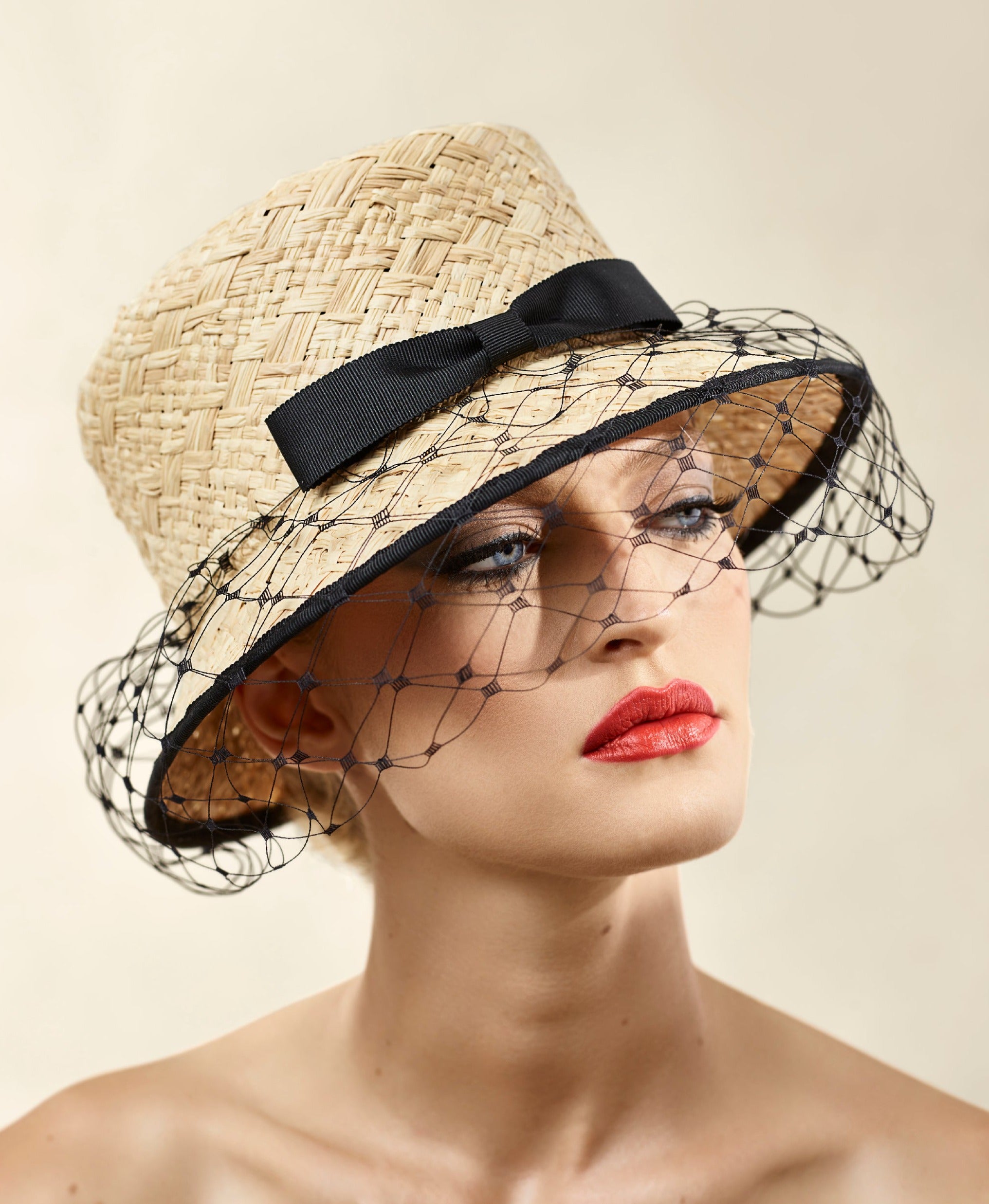 Misa Harada Hats| LUCILLE | Bucket hat in natural fancy raffia, wrapped with a black veil and grosgrain bow