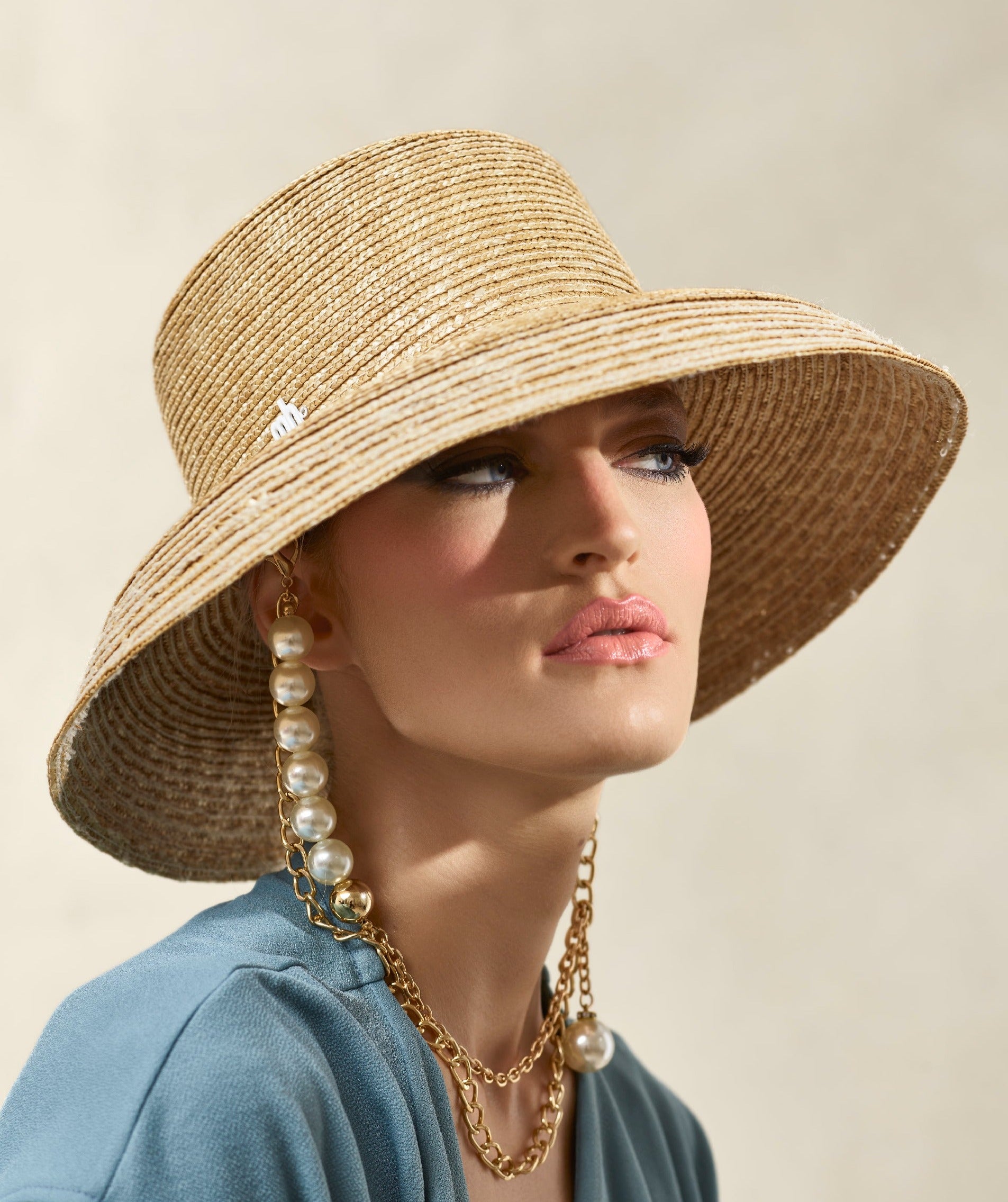 Misa Harada Hats| ZOE | Audrey style down brim in natural sewn straw, with mh logo and removable pearl and gold chains
